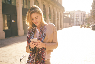 There's a path forward: Woman reading on mobile phone