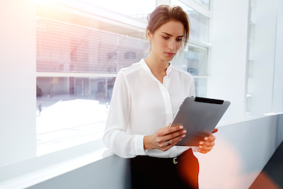 How Marketers Can Plan for the Recovery: Woman shopping on tablet