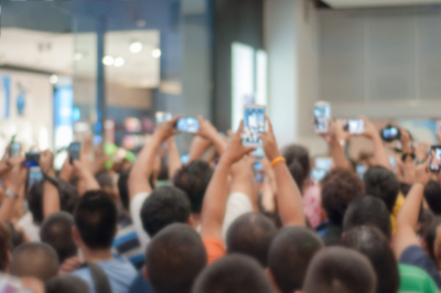 Why Digital Transformation Matters: Crowd of people all using mobile phones