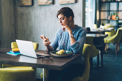 Did We Break the Internet? Or Did the Internet Break Us? Woman reads online news on social network