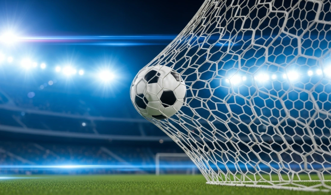 Photo of soccer ball hitting back of net to illustrate the idea that AI winners didn't pivot, they prepared.